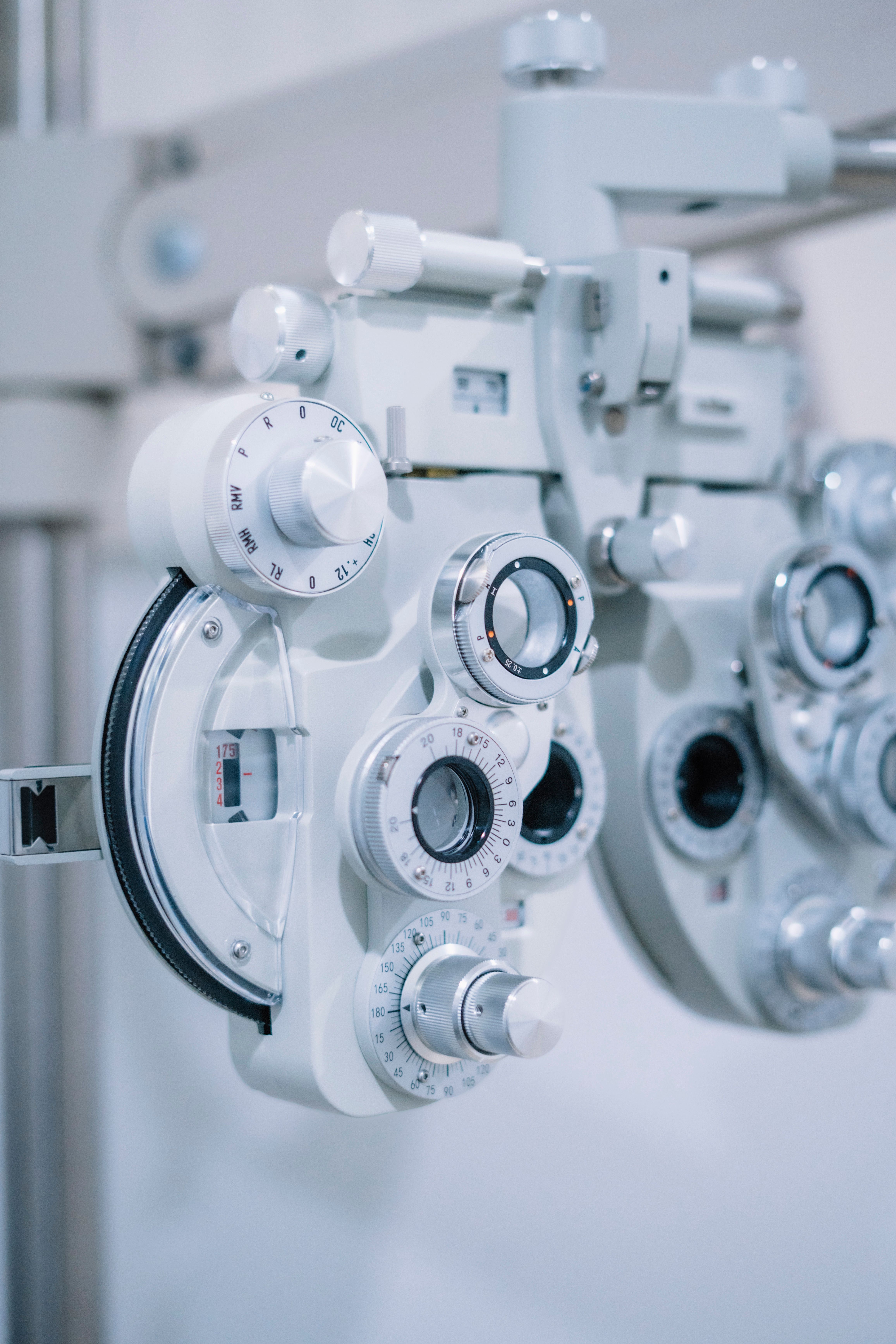 Optometrist fitting a patient with glasses